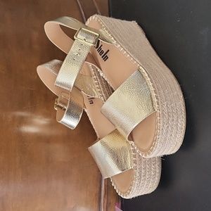 Beautiful gold platform sandals Size 8.5  New without box.
